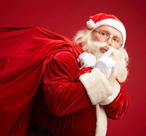 santa claus with sack of christmas gifts